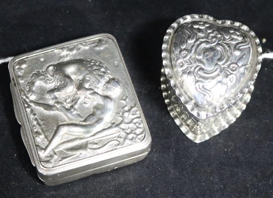 A 19th century French cast silver snuff box the cover decorated with Hercules and the Nemean lion and a Victorian heart shaped pill box